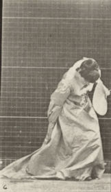 Plate 210 Stooping and lifting a dress, a fan in left hand — figure reference